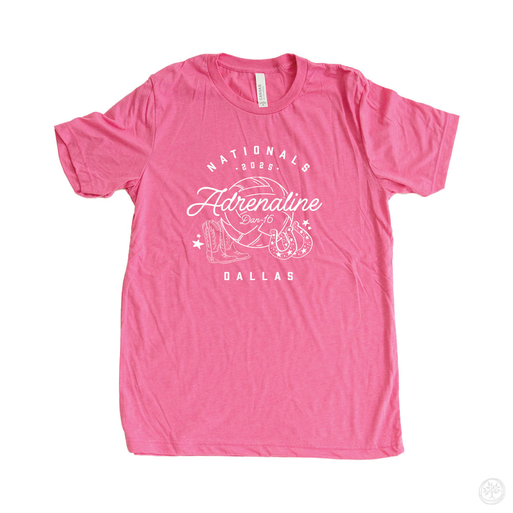 Adrenaline Nationals Tee (Pink) Alt Text: Pink t-shirt featuring a volleyball-themed design with the text “Adrenaline Dan-16,” “Nationals 2025,” and “Dallas,” surrounded by stars, boots, and a cowboy hat.