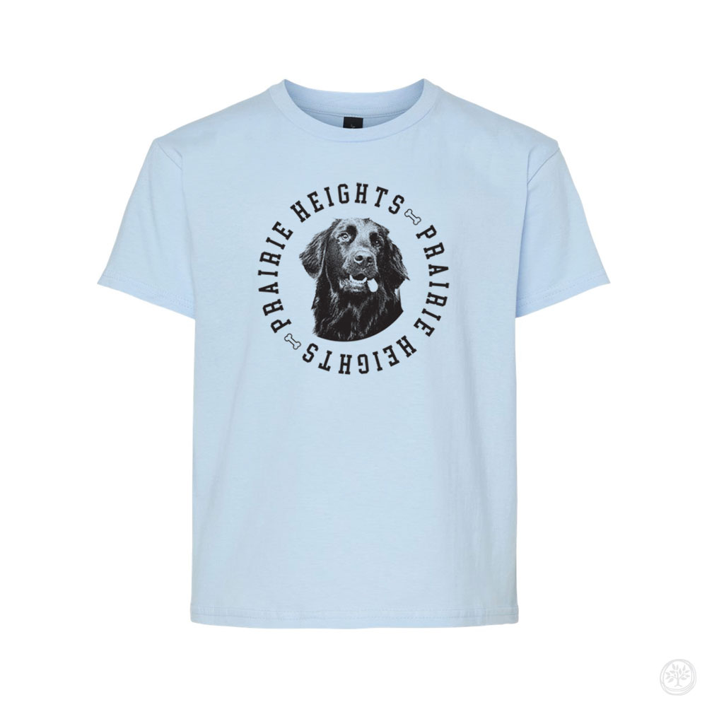 Prairie Heights Cedric Tee (Light Blue) Alt Text: Light blue t-shirt featuring a realistic drawing of a black dog surrounded by repeating “Prairie Heights” text in a circular layout with bone icons.